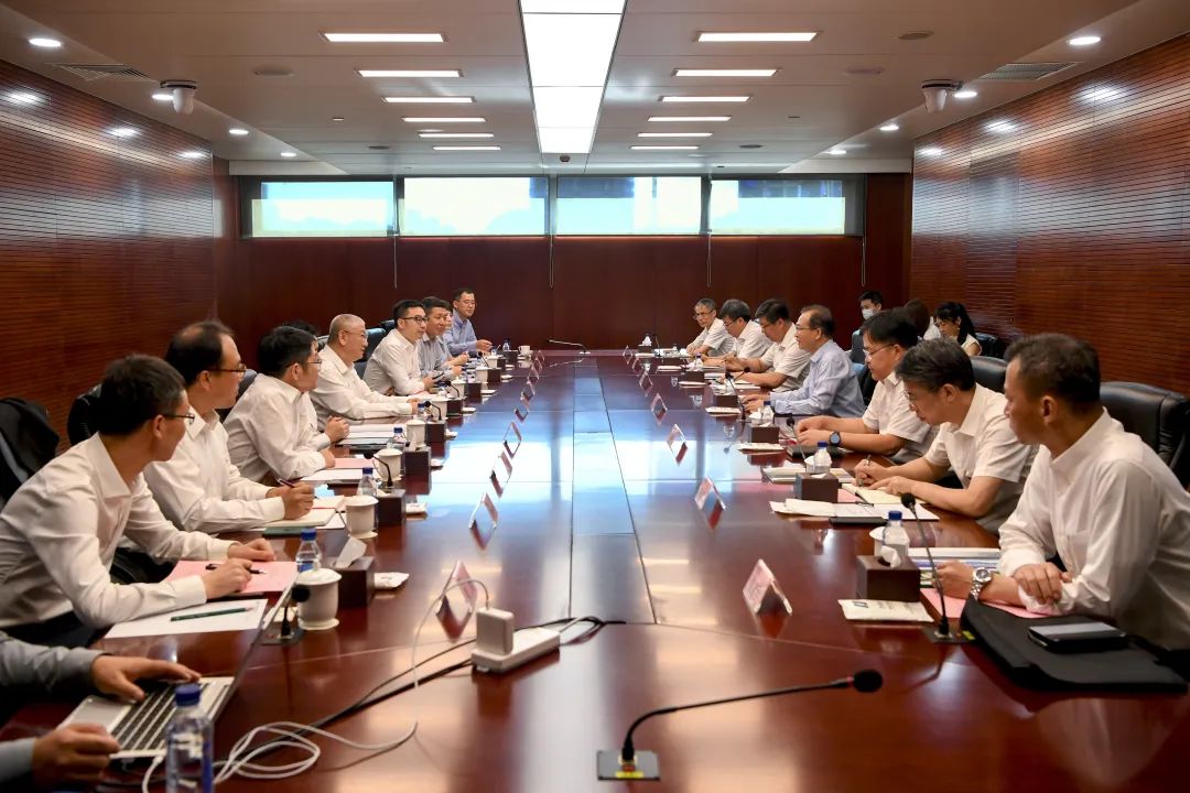 華電集團黨組書記、董事長江毅會見隆基綠能總裁李振國